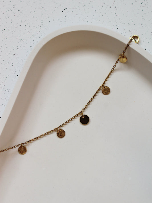 Armband mit Plättchen