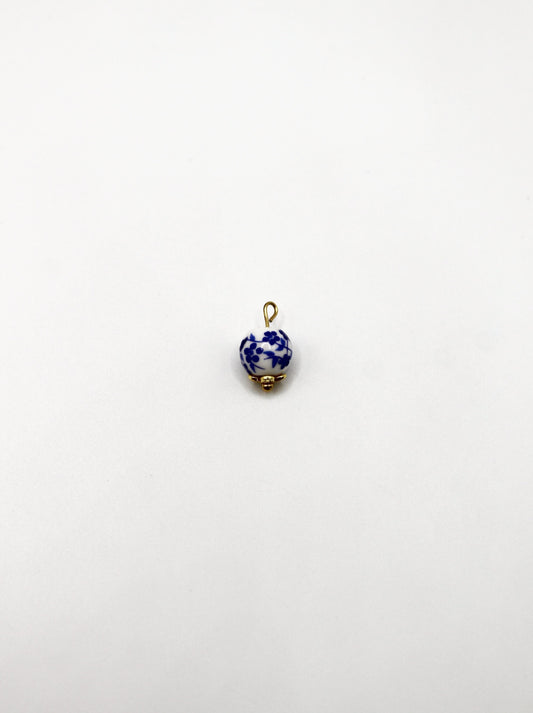 CHARM KERAMIKPERLE BLAU/WEIß VERGOLDET