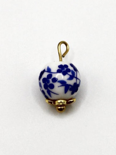 CHARM KERAMIKPERLE BLAU/WEIß VERGOLDET